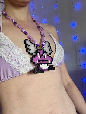 Nintendo Goomba Mario Bead Necklace — purple — glow in the dark beads